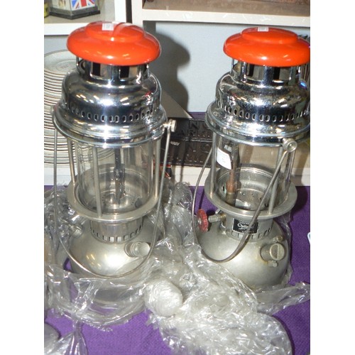 74 - PAIR OF LARGE OPTIMUS RED-TOP TILLEY LAMPS. 1350/350 CP. CHROME & RED. JENAER SUPRAX GLAS.