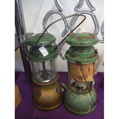 140 - 2 LARGE VINTAGE TILLEY TYPE LAMPS WITH GREEN TOPS.