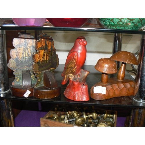 149 - TREEN. SMALL GALLEON BOOKENDS, TOADSTOOLS AND A RED BIRD.