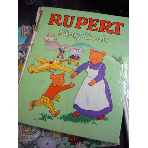 195 - STACK OF 9 VINTAGE RUPERT ANNUALS.