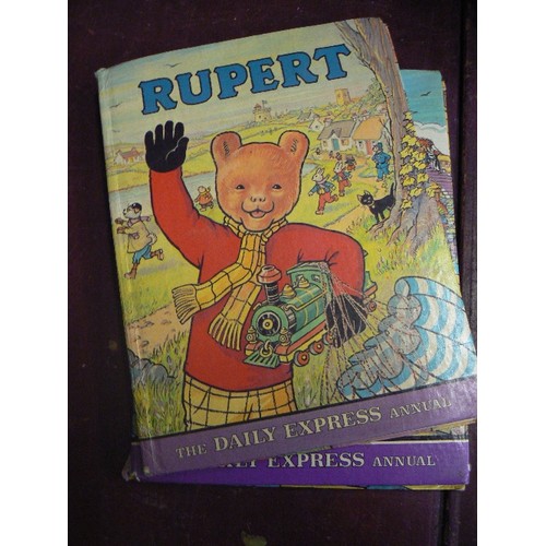 195 - STACK OF 9 VINTAGE RUPERT ANNUALS.