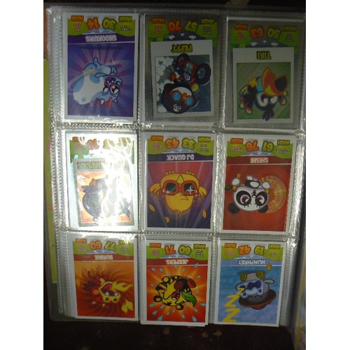 196 - MOSHI-MONSTERS MASH-UP TRADING GAME IN COLLECTOR BINDER. WITH CONTENTS.