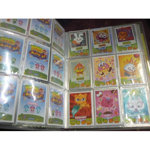 196 - MOSHI-MONSTERS MASH-UP TRADING GAME IN COLLECTOR BINDER. WITH CONTENTS.