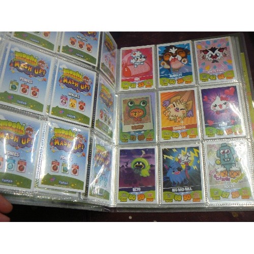 196 - MOSHI-MONSTERS MASH-UP TRADING GAME IN COLLECTOR BINDER. WITH CONTENTS.