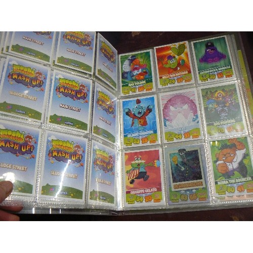 196 - MOSHI-MONSTERS MASH-UP TRADING GAME IN COLLECTOR BINDER. WITH CONTENTS.