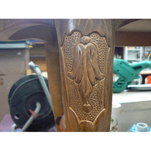 306 - SMALL CARVED COFFEE TABLE ON CABRIOLE LEGS.