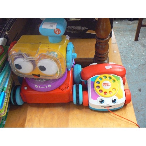 263 - FISHER-PRICE TODDLER PULL-ALONG ROBOT, TELEPHONE, STACK OF TODDLER BOOKS.