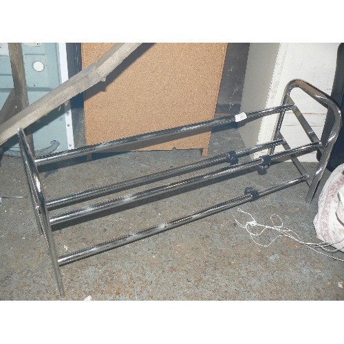 351 - ADJUSTABLE SHOE RACK. TUBULAR CHROME.