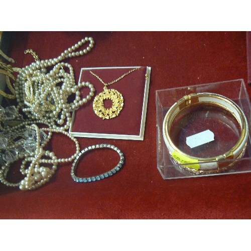 48 - A BOX OF COSTUME JEWELLERY SOME VERY NICE BRACELETS PEARLS AND NECKLACES