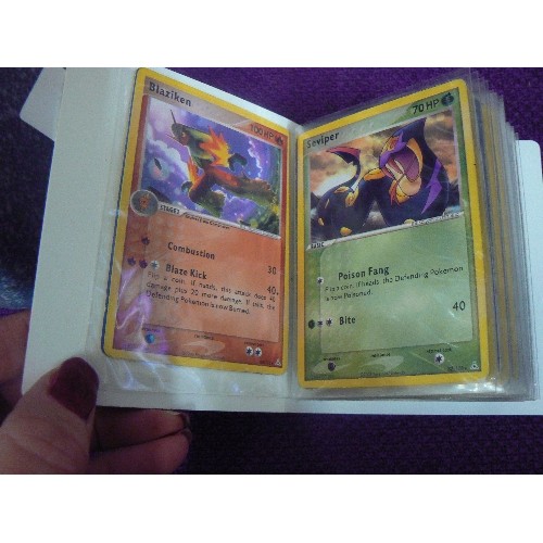 92 - POKEMON LOT. INCLUDES BASEBALL CAP, SMALL ALBUM OF TRADING CARDS, & BOXED SET OF 14 BOOKS.