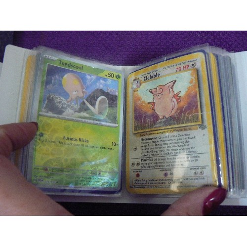 92 - POKEMON LOT. INCLUDES BASEBALL CAP, SMALL ALBUM OF TRADING CARDS, & BOXED SET OF 14 BOOKS.