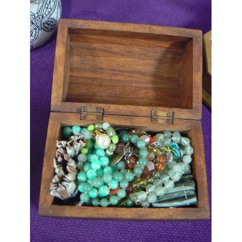 103 - WOODEN CARVED JEWELLERY BOX IN THE SHAPE OF A CHEST WITH CONTENTS OF COSTUME JEWELLERY