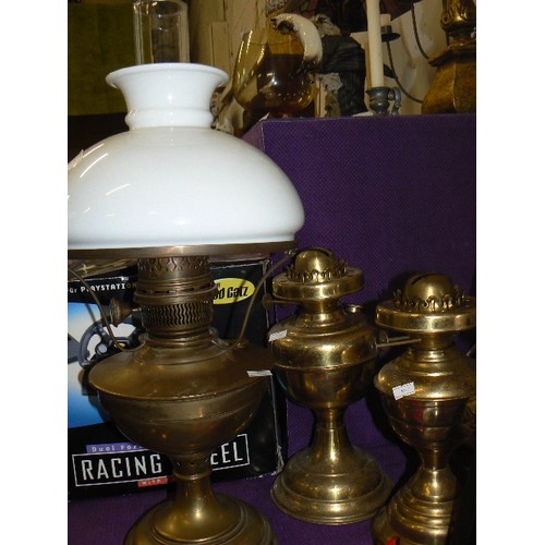 113 - BRASS OIL LAMP WITH GLASS SHADE PLUS A FURTHER 2 BRASS OIL LAMP BASSES