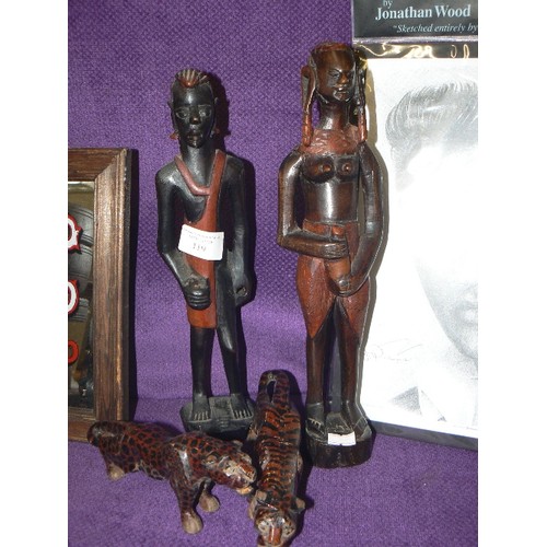 119 - PAIR OF CARVED WOODEN AFRICAN FIGURES PLUS A PAIR OF WOODEN FIGURES DEPICTING A LEOPARD AND A TIGER