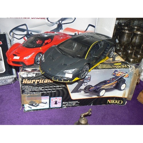 109 - NIKKO RADIO CONTROLLED HURRICANE 4WD RACER PLUS 2 LARGE CAR MODELS