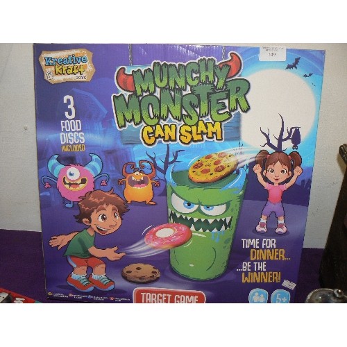 149 - MUNCHY MONSTER CAN SLAM TARGET GAME PLUS 2 LOGO BOARD GAMES