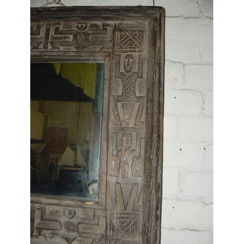 180 - CARVED WOODEN AZTEC DESIGN FRAMED MIRROR