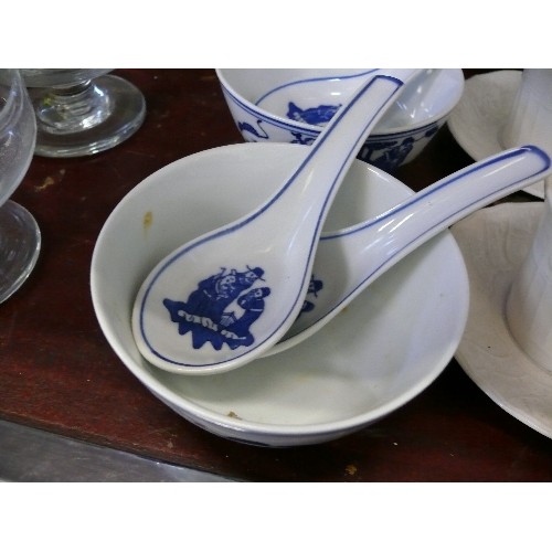 216 - BLUE AND WHITE ORIENTAL RICE BOWLS AND SPOONS