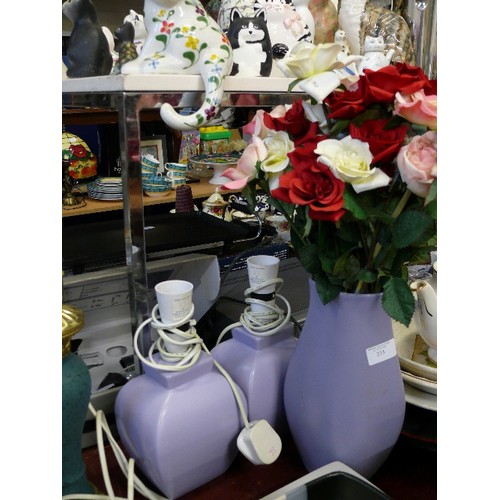 233 - LILAC COLOURED CERAMIC VASE WITH CONTENTS OF ARTIFICAL FLOWERS PLUS A MATCHING PAIR OF LILAC COLOURE... 