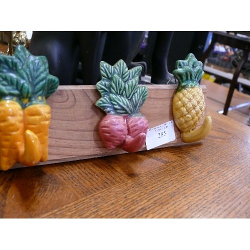 285 - CERAMIC VEGETABLE THEMED HOOKS ON A WOODEN BACK