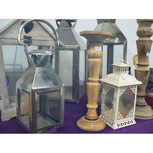 123 - LARGE COLLECTION OF LANTERNS AND CANDLESTICKS.