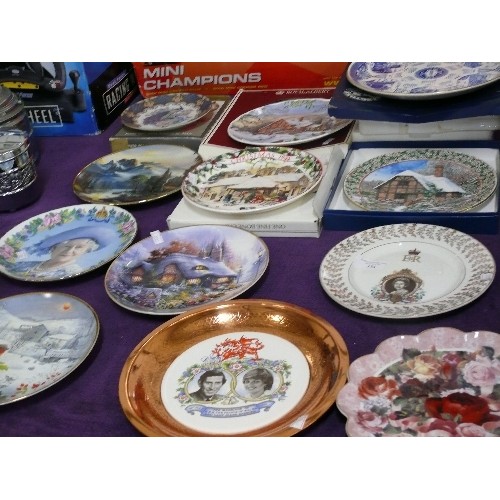 134 - LARGE QUANTITY OF COLLECTORS' PLATES BY MIXED MAKERS INCLUDING ROYAL ALBERT, WEDGWOOD AND ROYAL DOUL... 