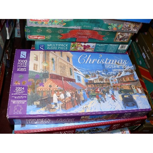 214 - SELECTION OF SEVENTEEN JIGSAW PUZZLES MANY CHRISTMAS THEMED INCLUDING WADDINGTONS, RAVENSBURGER AND ... 