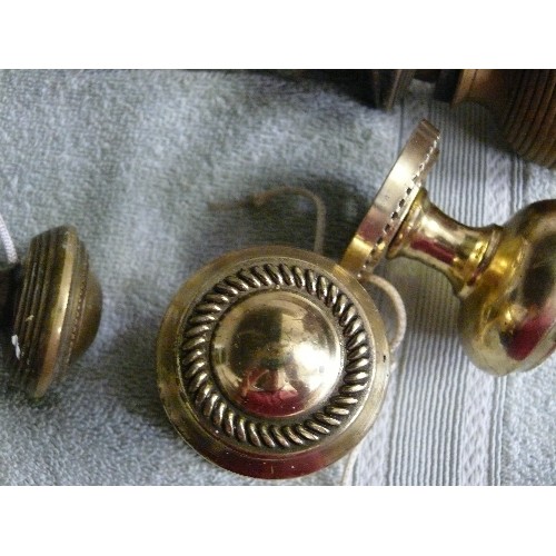 202 - FOUR PAIRS OF DECORATIVE BRASS DOOR KNOBS.