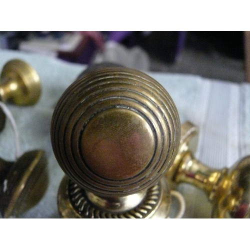 202 - FOUR PAIRS OF DECORATIVE BRASS DOOR KNOBS.