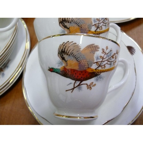 233 - PHEASANT THEMED BONE CHINA PART TEASET.