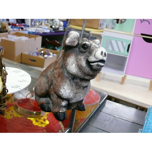 277 - LARGE HEAVY PIG FIGURE, A WICKER PIG AND A PIG CLOCK.