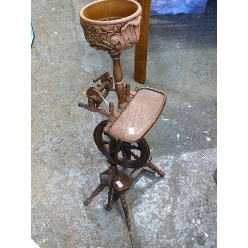 385 - NICE MODEL OF A SPINNING WHEEL PLANT POT HOLDER.