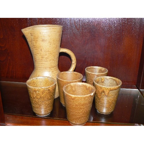 398 - FRENCH STONEWARE JUG AND FIVE MATCHING BEAKERS.