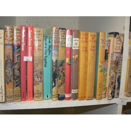 323 - FOUR CUBES OF VARIOUS VINTAGE ENID BLYTON BOOKS.