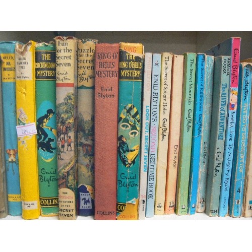 324 - FOUR CUBES OF VARIOUS VINTAGE ENID BLYTON BOOKS.