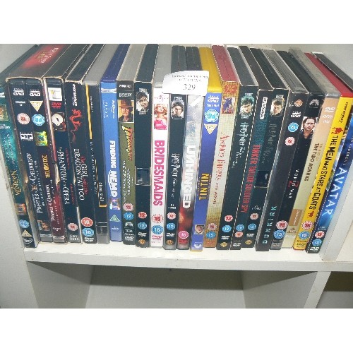 329 - QUANTITY OF DVD'S INCLUDING PIRATES OF THE CARRIBEAN, HARRY POTTER AND ABSOLUTELY FABULOUS.