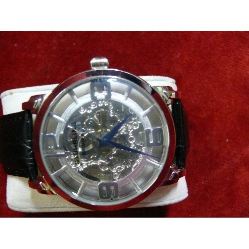 24 - A STUHRLING ORIGINAL AUTOMATIC SKELETON GENTS WATCH WORKING UNWORN.