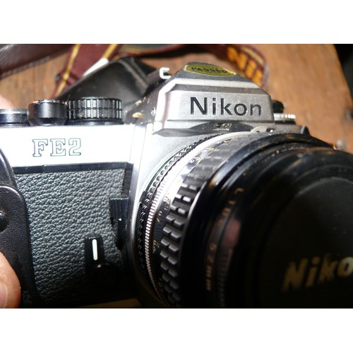 494 - NIKON FE2 CAMERA TRADITIONAL SLR WITH CASE.