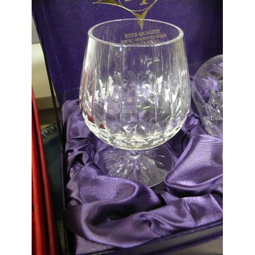 82 - BOXED SET OF CRYSTAL WINE GLASSES PLUS A BOXED SET OF CRYSTAL BRANDY GLASSES.