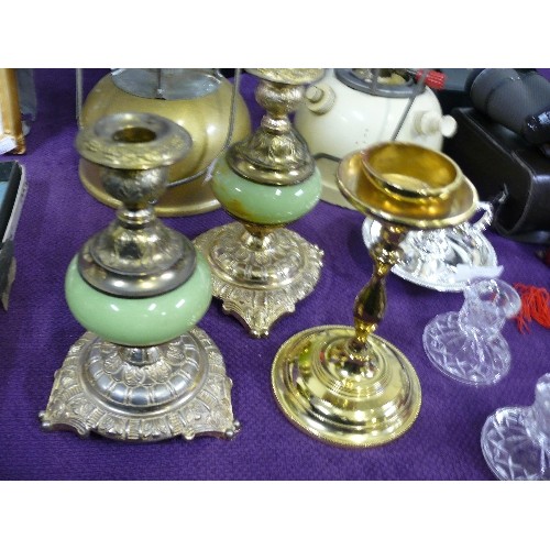 113 - COLLECTION OF BRASS AND SILVERPLATED CANDLESTICKS PLUS A PAIR OF CRYSTAL CANDLESTICKS.