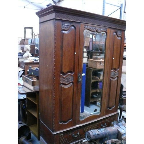 436 - Large late Victorian mahogany wardrobe 144cm x52cm x 207cm with carved detail and mirrored door, tog... 