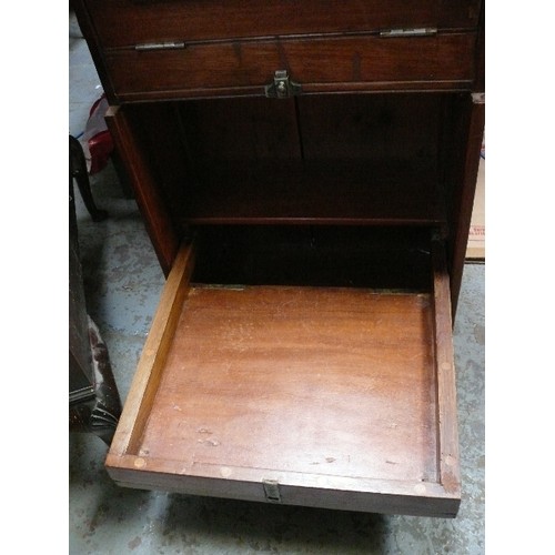 402 - An unusual Edwardian miniature bureau cabinet with drop down doors and shelving