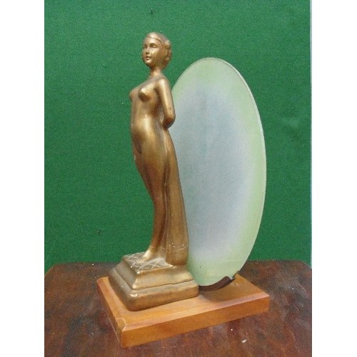 228 - An Art Deco nude lady figure in gilt finish with green glass disc behind - originally a lamp. Repair... 