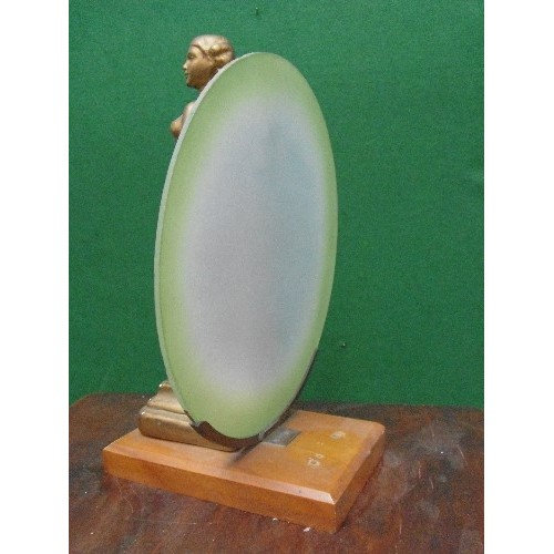 228 - An Art Deco nude lady figure in gilt finish with green glass disc behind - originally a lamp. Repair... 