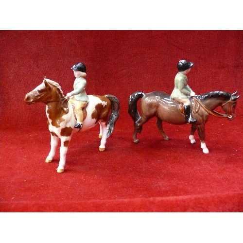 11 - Beswick boy on brown horse and a girl on a skewbald pony (No 1499) - both in very good condition