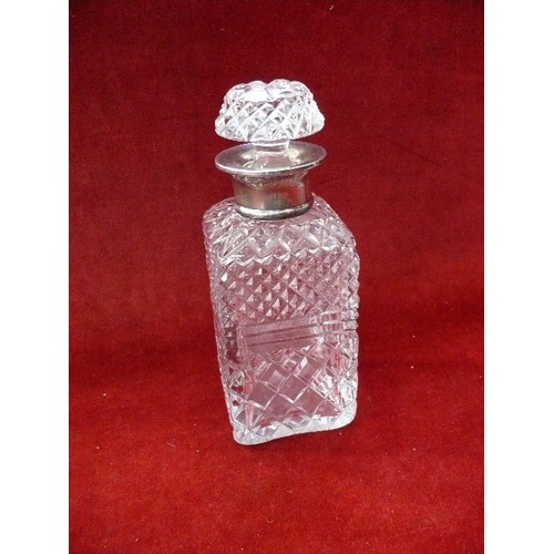 43 - A good quality cut crystal spirit decanter with silver collar hallmarked London 1959. Matching stopp... 