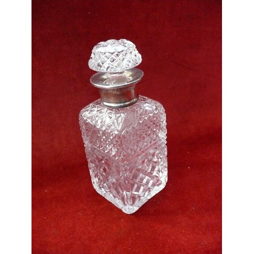 43 - A good quality cut crystal spirit decanter with silver collar hallmarked London 1959. Matching stopp... 