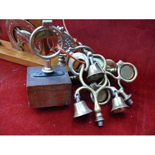 373 - Swingers and bell head terrets including triple bell, triple disc, 2 x crescent and a display stand ... 