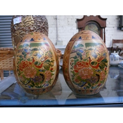 190 - Pair of Satsuma type oriental ceramic eggs, hand decorated with pheasants and flowers - 18cm