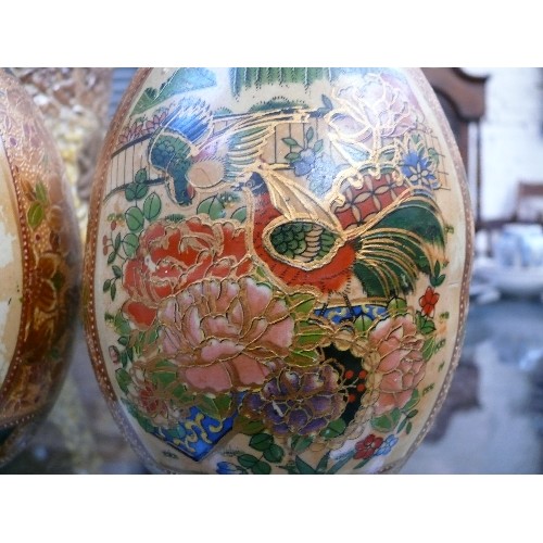 190 - Pair of Satsuma type oriental ceramic eggs, hand decorated with pheasants and flowers - 18cm